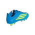 A blue soccer cleat with lime green accents, shown from a rear-quarter angle against a black background. The shoe features three diagonal lime green stripes on the side and a mixture of lime green and blue studs on the sole.