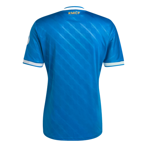 Back view of a blue soccer jersey with diagonal textured stripes, white sleeve cuffs, and gold "RMCF" lettering on the collar, set against a solid black background.