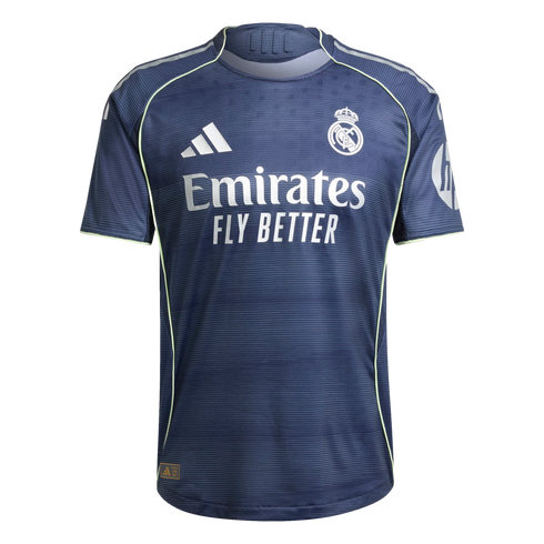 A dark blue Real Madrid soccer jersey featuring white Adidas, club crest, and Emirates sponsor logos, accented with light green trim and an HP logo on the sleeve.