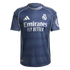 A dark blue Real Madrid soccer jersey featuring white Adidas, club crest, and Emirates sponsor logos, accented with light green trim and an HP logo on the sleeve.