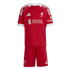 Children’s red Liverpool F.C. home football kit, featuring a short-sleeved jersey and matching shorts with white Adidas stripes, team crest, and sponsor logos.