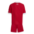 Rear view of a red soccer kit. The jersey features a white collar and cuffs, with a '97' memorial flame logo on the upper back. Includes matching red shorts.