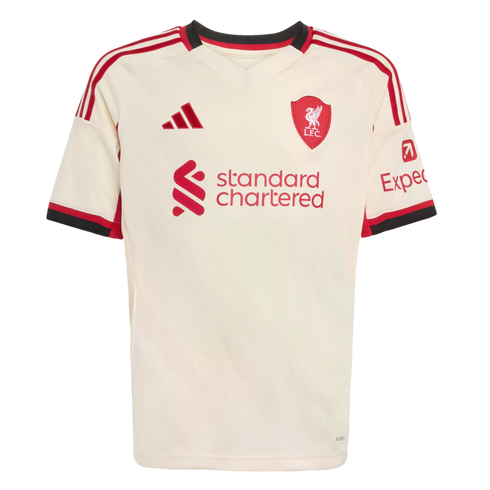 An off-white Liverpool F.C. football jersey with red Adidas stripes, club crest, and sponsor logos. Features red and black trim on the collar and cuffs.