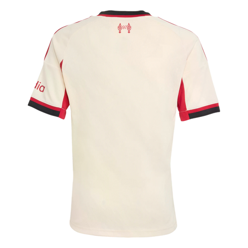 Back of a cream-colored soccer jersey with red and black trim. Features a '97' flame emblem on the upper back and red sleeve details, displayed on a black background.