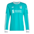 A teal long-sleeved Liverpool F.C. jersey with white striped trim, featuring the Adidas logo, club crest, and Standard Chartered sponsor.