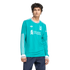 A man with dark curly hair wears a long-sleeved teal Adidas Liverpool FC jersey and dark blue jeans against a white background.