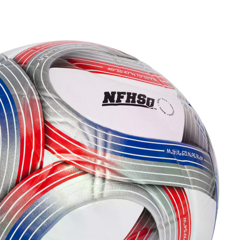 Close-up of a soccer ball with red, blue, and silver striped designs on white panels, featuring geographic coordinates and the NFHS logo.