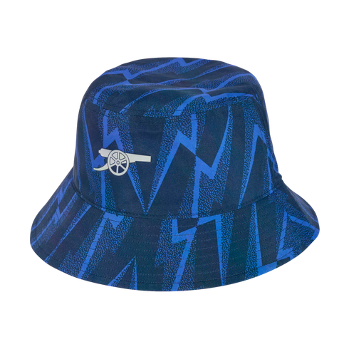 Blue and navy zigzag patterned bucket hat featuring a white Arsenal cannon logo.