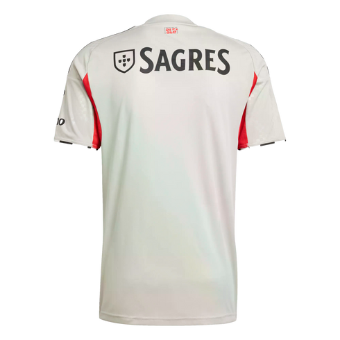 The back of a light grey soccer jersey featuring a black "SAGRES" sponsor logo, red side panels, and black shoulder stripes.