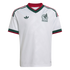 A white Adidas Mexico national team soccer jersey with red and green accents on the v-neck collar, shoulders, and sleeves, featuring the team crest and trefoil logo.