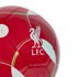 A glossy red soccer ball featuring the white Liverpool FC crest and decorative gold and white curved patterns.