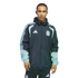 Man wearing a navy and light blue Adidas Argentina national football team windbreaker and matching pants with the AFA crest, against a black background.