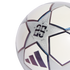 Close-up of an Adidas UEFA Champions League soccer ball with a "25 YEARS" anniversary star panel and iridescent details on a black background.