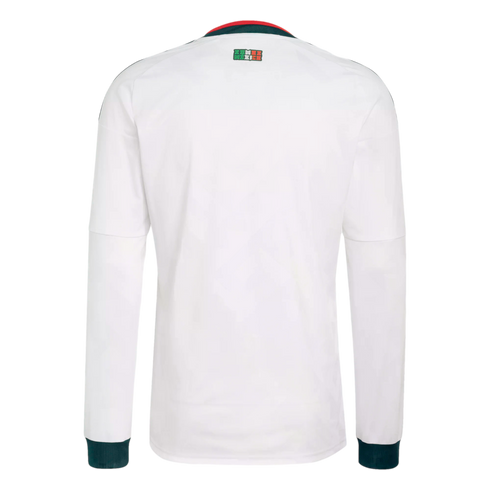 Back view of a white long-sleeved Mexico soccer jersey with green and red collar accents and dark green cuffs. A small Mexico logo is on the upper back.