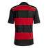Back view of a red and black horizontally striped soccer jersey with solid black sleeves and "DIE NATIONALMANNSCHAFT" text on the back collar.