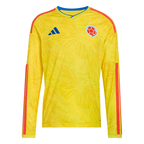 Yellow long-sleeved Colombia soccer jersey with tonal butterfly pattern, red shoulder and sleeve stripes, blue Adidas logo, and team crest on the chest.