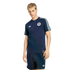A man wearing a navy blue Adidas Germany national football team t-shirt and matching shorts, standing against a solid black background.