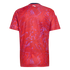 Back view of a red short-sleeved jersey with a purple abstract swirled pattern. A small white script logo is centered below the dark blue collar line.