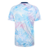 Back of a short-sleeved jersey with a light blue and pink tropical leaf print on white. It has a navy blue collar and small pink "Pura Vida" text at the top center.