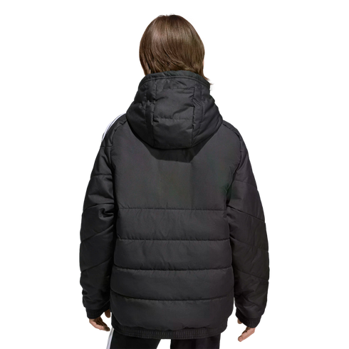 Rear view of a person in a black hooded puffer jacket with white sleeve stripes, standing against a plain black background.
