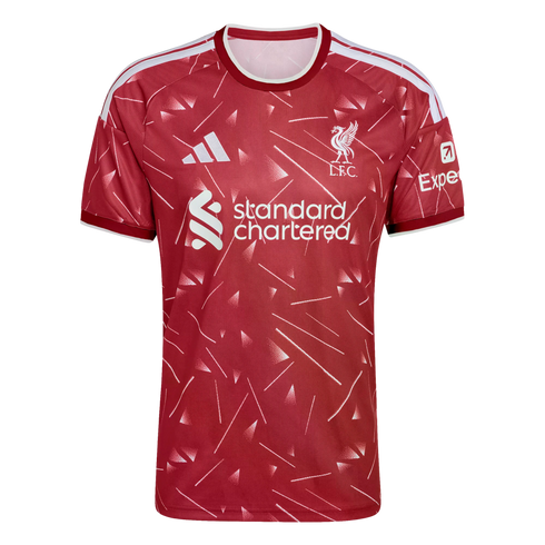 Red Liverpool F.C. football jersey with a white geometric pattern, featuring the Adidas logo, club crest, and Standard Chartered sponsor on the chest.