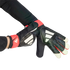 Hands in black, red, and white Adidas goalkeeper gloves against a black backdrop. One hand adjusts the wrist strap of the other.