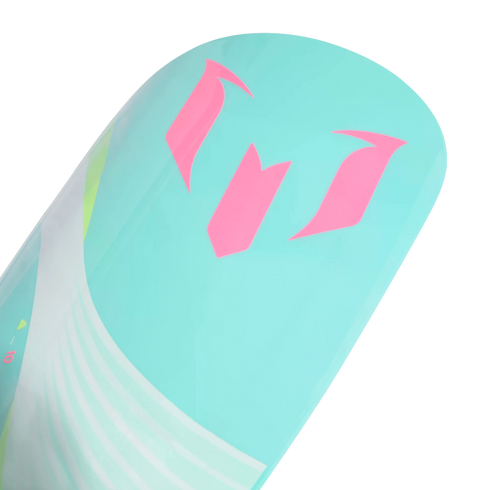 Close-up of a teal shin guard featuring a pink Lionel Messi logo and white graphic elements against a black background.