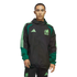 A man wearing a black and green Adidas Mexico National Team windbreaker and matching pants stands against a black background. The jacket features light green team and brand logos.
