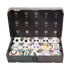 A display box containing 15 miniature Adidas World Cup soccer balls, with historical ball design illustrations on the inner lid.