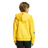 Rear view of a child with light brown hair wearing a bright yellow hoodie and black pants, isolated against a black background.