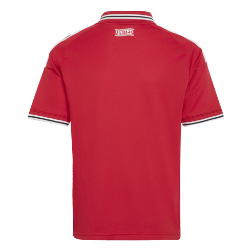 Back of a red short-sleeved jersey with white shoulder stripes, striped trim on the collar and cuffs, and the word "UNITED" printed in white below the collar.