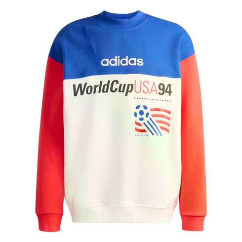 A color-blocked adidas sweatshirt commemorating World Cup USA 94. It features a blue upper panel with a white adidas logo, red sleeves, and a white lower section with the text "WorldCupUSA94" and the tournament's official soccer ball logo.