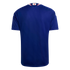 Rear view of a dark blue soccer jersey with white shoulder stripes and a small Japanese flag on the back collar.