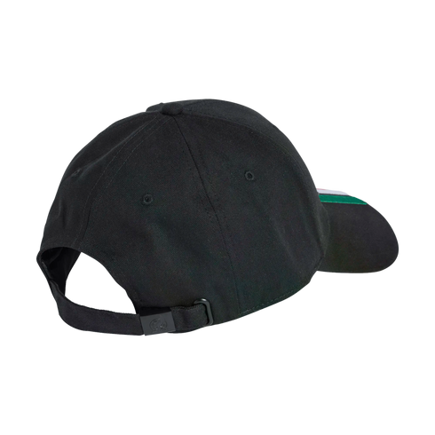 Rear-angled view of a black baseball cap featuring an adjustable back strap and a hint of a green and white brim on the side.
