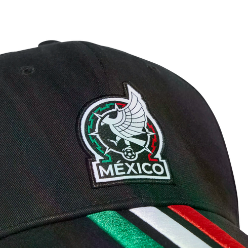 A black baseball cap featuring the Mexico national football team crest on the front and green, white, and red stripes on the brim.