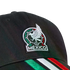 A black baseball cap featuring the Mexico national football team crest on the front and green, white, and red stripes on the brim.