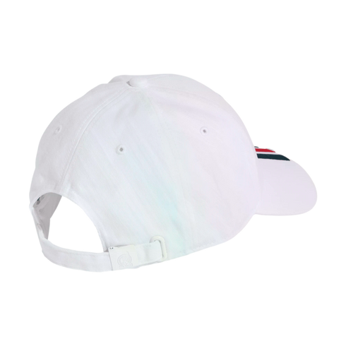 Rear view of a white baseball cap against a black background, featuring an adjustable strap and a small red, white, and blue striped detail on the side of the brim.