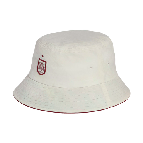 A white bucket hat featuring the red Spain national football team crest and a small star on the front. The brim has a thin red edge.