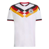 White Germany home football jersey featuring a bold black, red, and gold V-shaped pattern on the chest, team crest, and silver Adidas logo.
