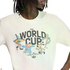 Person wearing a white Adidas FIFA World Cup t-shirt with classic mascots and the phrase "Football with friends" against a black background.