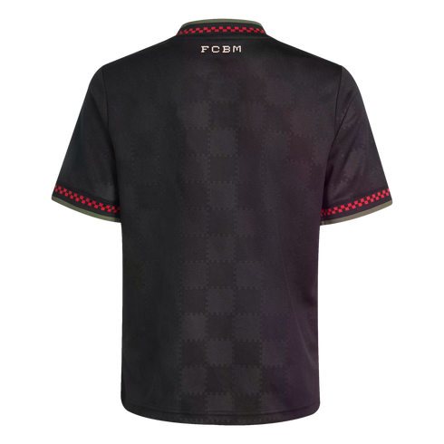 Back of a black short-sleeved jersey with a tonal checkerboard pattern, "FCBM" on the upper back, and red-and-black checkered trim on the olive green collar and sleeve cuffs.