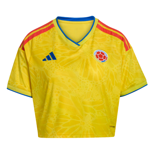 A yellow Colombia national team crop-top soccer jersey featuring a subtle tonal pattern and red-and-blue accents.
