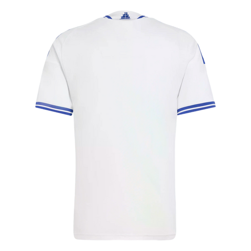 The back of a white short-sleeved sports jersey with blue and white striped trim on the cuffs and collar, featuring a small blue logo at the nape of the neck.