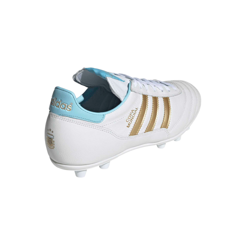 White Adidas Copa Mundial soccer cleat with gold stripes and light blue trim. Features the Argentina AFA crest on the heel. Set against a black background.