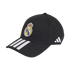A black Adidas baseball cap featuring the Real Madrid team crest on the front and three white stripes on the visor.