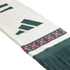 White knitted scarf with a dark green Adidas mountain logo and a horizontal green and pink patterned band above dark green fringe.