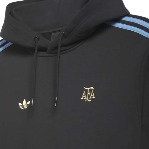 Close-up of a black hoodie with gold Adidas and AFA logos and light blue stripes on the shoulders.