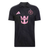 A black, short-sleeved Inter Miami CF away soccer jersey shown from the front. The jersey features a polo collar and bright pink accents, including the Adidas logo on the right chest, the club's circular crest on the left chest, and a large Royal Caribbea