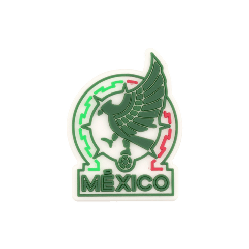 Rubber shoe charm of the Mexico national football team logo, featuring a stylized green eagle and the word "MÉXICO" at the bottom.
