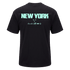 Back view of a black short-sleeve t-shirt featuring "NEW YORK" in large mint green block letters above smaller Nike Soccer logos.